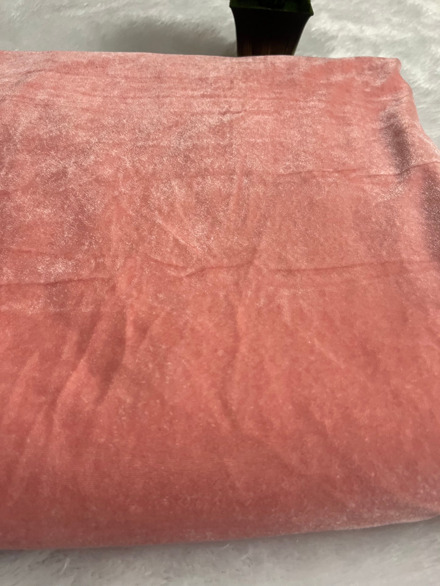 Light peach shade velvet fabric