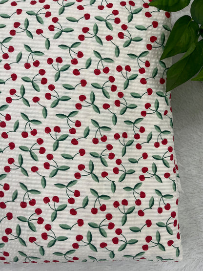 Cotton seersucker fabric with cherry design