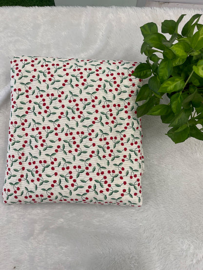 Cotton seersucker fabric with cherry design