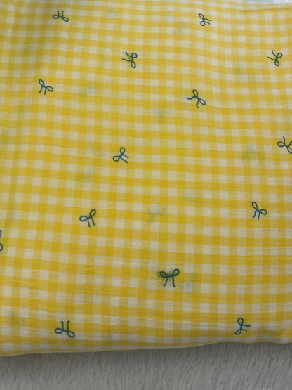 Yellow Shade With Bow Design muslin Fabric