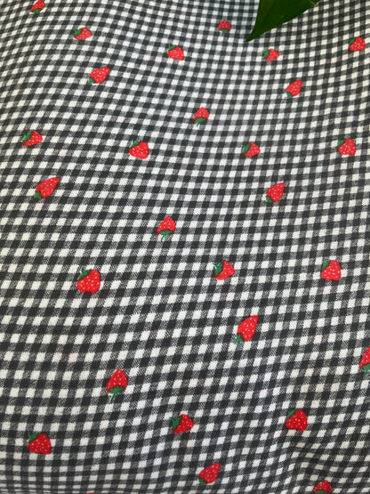 Black shade check fabric with Strawberry design