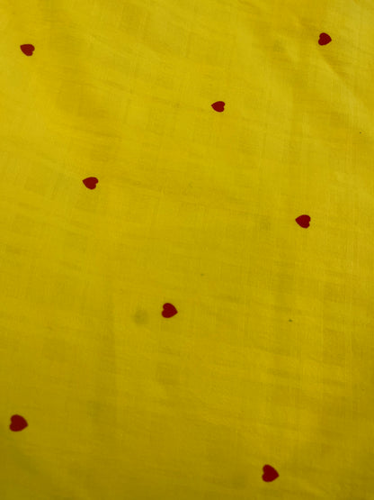 YELLOW SHADE COTTON FABRIC WITH RED HEART