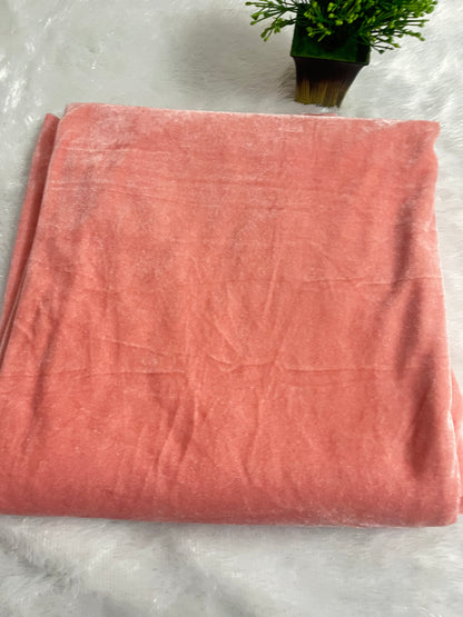Light peach shade velvet fabric